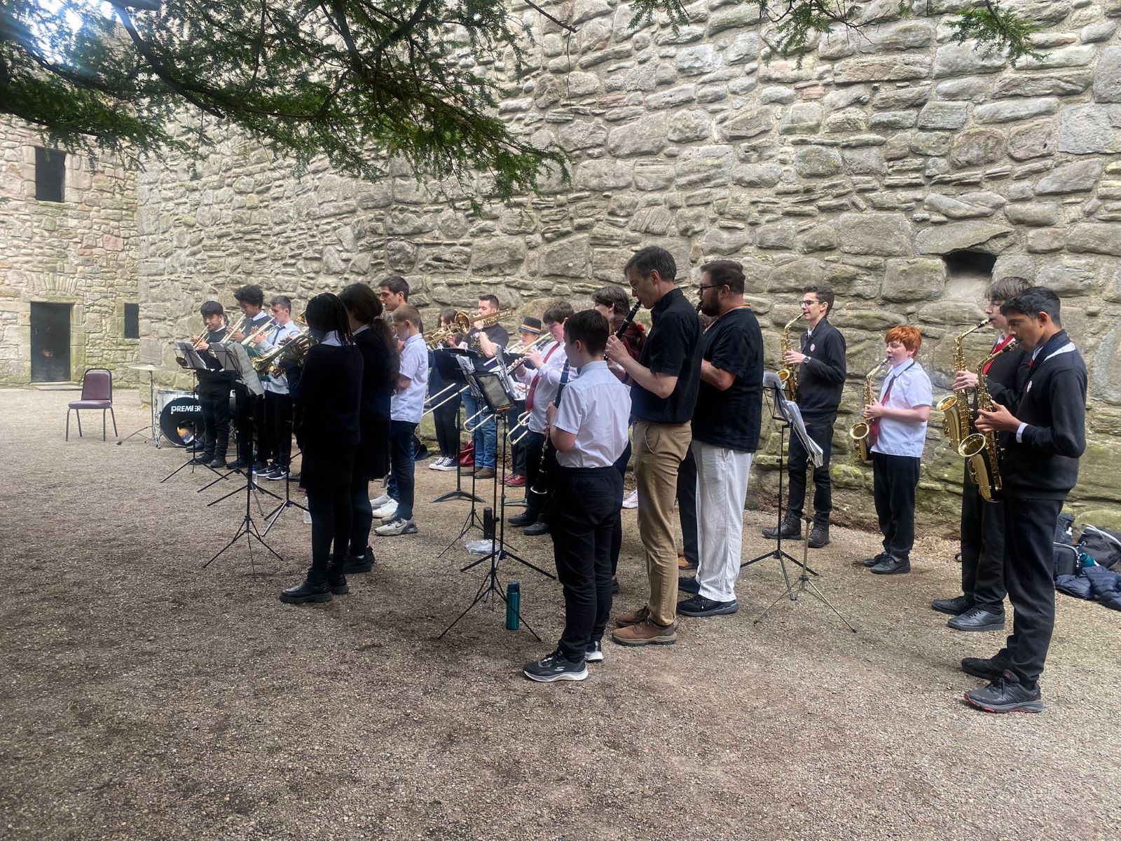 Young musicians perform in a band in the Castle Courtyard